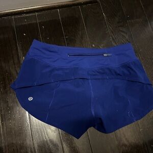 Royal blue speed up shorts 2.5’ inseam. Size 4